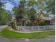 Quaint craftsman style home with white picket fence and manicured lawn at 120 A Da Gullah Way # A, Pawleys Island, SC 29585