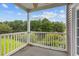 Spacious balcony with scenic views of the lake and surrounding greenery at 885 Palmetto Trail # 201, Myrtle Beach, SC 29577