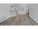 Bright dining room features hardwood floors and an elegant chandelier at 885 Palmetto Trail # 201, Myrtle Beach, SC 29577