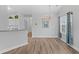 Dining room with hardwood floors and a chandelier at 885 Palmetto Trail # 201, Myrtle Beach, SC 29577