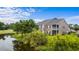 Townhouse with screened porch overlooking a pond at 885 Palmetto Trail # 201, Myrtle Beach, SC 29577