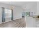 Open living room and dining area with high ceilings at 885 Palmetto Trail # 201, Myrtle Beach, SC 29577