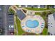 Community pool with surrounding lounge chairs and patio area at 885 Palmetto Trail # 201, Myrtle Beach, SC 29577