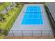 Blue tennis court with grey boundary lines at 10200 Beach Club Dr. # 14D, Myrtle Beach, SC 29572