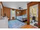 Bright bedroom with a metal bed frame and ensuite bathroom at 2403 Park St., North Myrtle Beach, SC 29582