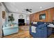 Spacious living room featuring wood floors, comfy sofas, and a ceiling fan at 2403 Park St., North Myrtle Beach, SC 29582
