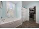 Soaking tub bathroom with a walk-in closet at 1225 White Fox Ct., Conway, SC 29526
