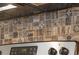 Detailed view of a kitchen backsplash with patterned tile at 1225 White Fox Ct., Conway, SC 29526