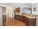 Granite countertops and stainless steel appliances highlight this kitchen's modern design at 1225 White Fox Ct., Conway, SC 29526