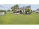 Landscaped backyard with a grassy lawn and a view of the house at 1225 White Fox Ct., Conway, SC 29526