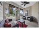 Relaxing screened porch with seating and a view of the backyard at 1225 White Fox Ct., Conway, SC 29526