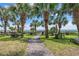 Wooden walkway to beach with palm trees at 2300 N Ocean Blvd. # 238, Myrtle Beach, SC 29577
