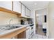 Simple kitchen with stove, sink, and cabinets at 2300 N Ocean Blvd. # 238, Myrtle Beach, SC 29577