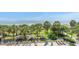 Oceanfront property with palm trees and lounge chairs at 2300 N Ocean Blvd. # 238, Myrtle Beach, SC 29577