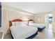 Bedroom with two twin beds, nightstands, and wood dresser at 2300 N Ocean Blvd. # 238, Myrtle Beach, SC 29577