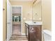 Bathroom with vanity, toilet, and mirror at 125 S Shore Blvd. # 302, Longs, SC 29568