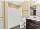 Clean bathroom with shower/tub combo, toilet and dark vanity at 125 S Shore Blvd. # 302, Longs, SC 29568