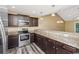 Modern kitchen with stainless steel appliances and granite countertops at 125 S Shore Blvd. # 302, Longs, SC 29568