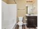 Clean bathroom with shower/tub combo, toilet and dark vanity at 125 S Shore Blvd. # 302, Longs, SC 29568