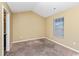 Simple bedroom with carpet flooring and a large window at 125 S Shore Blvd. # 302, Longs, SC 29568