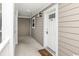 Inviting entryway with a white door and leopard print welcome mat at 125 S Shore Blvd. # 302, Longs, SC 29568
