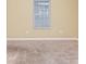 Empty carpeted bedroom with a window and neutral-colored walls at 125 S Shore Blvd. # 302, Longs, SC 29568