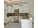 A kitchen with white cabinets and granite countertops at 108 Hallandale Lane, Murrells Inlet, SC 29576