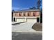 New construction duplex with attached garages and neutral exterior at 108 Hallandale Lane, Murrells Inlet, SC 29576