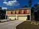 Two-unit building with attached garages and landscaping at 108 Hallandale Lane, Murrells Inlet, SC 29576