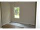 A bedroom with wood flooring and a window at 108 Hallandale Lane, Murrells Inlet, SC 29576