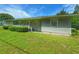 Gray single story home with front porch at 312 13Th Ave. S, Surfside Beach, SC 29575