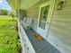 Quaint front porch with rocking chairs at 312 13Th Ave. S, Surfside Beach, SC 29575