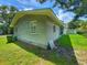 Gray house exterior with green lawn and shed at 312 13Th Ave. S, Surfside Beach, SC 29575