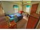 Bedroom with double bed, couch and ceiling fan at 312 13Th Ave. S, Surfside Beach, SC 29575