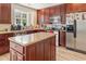 Modern kitchen with granite countertops and stainless steel appliances at 4025 Captiva Row, Myrtle Beach, SC 29579