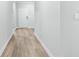 Light and bright hallway with wood-look flooring at 7077 Watercress St, Myrtle Beach, SC 29579