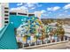Large water park with multiple slides and a surrounding deck with lounge chairs at 1501 S Ocean Blvd. # 1150, Myrtle Beach, SC 29577