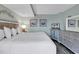 Main bedroom with king bed and coastal decor at 1501 S Ocean Blvd. # 1150, Myrtle Beach, SC 29577