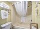 Clean bathroom with shower/tub combo and shelf for towels at 2311 Ocean Blvd. S # 361, Myrtle Beach, SC 29577