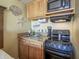 Small kitchen with stovetop, microwave, and mini-fridge at 2311 Ocean Blvd. S # 361, Myrtle Beach, SC 29577