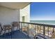 Balcony with ocean view and seating for two at 2311 Ocean Blvd. S # 361, Myrtle Beach, SC 29577