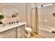 Clean bathroom with a shower/tub combo and marble vanity at 10 Saltwater Way, Murrells Inlet, SC 29576