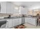 Well-equipped kitchen with white cabinets and stainless steel appliances at 6001-C21 S Kings Hwy., Myrtle Beach, SC 29575