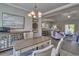 Open concept dining room with a view into the living room and kitchen at Tbb Shady Grove Rd., Conway, SC 29527