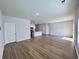 Bright and airy living room with wood-look floors and access to backyard at 163 Marsh Deer Place, Surfside Beach, SC 29575