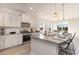 Modern kitchen with stainless steel appliances and granite countertops at 7043 Shooting Star Way, Myrtle Beach, SC 29579