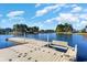 Community dock with seating, offering scenic water views at 7043 Shooting Star Way, Myrtle Beach, SC 29579