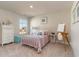 Cozy bedroom with metal bed frame and white dresser at 7043 Shooting Star Way, Myrtle Beach, SC 29579
