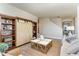 Spacious living room with built in shelving and a view of the entryway at 7043 Shooting Star Way, Myrtle Beach, SC 29579