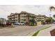Three-story building with ample parking and lush landscaping at 2805 N Ocean Blvd. # 301, Myrtle Beach, SC 29577